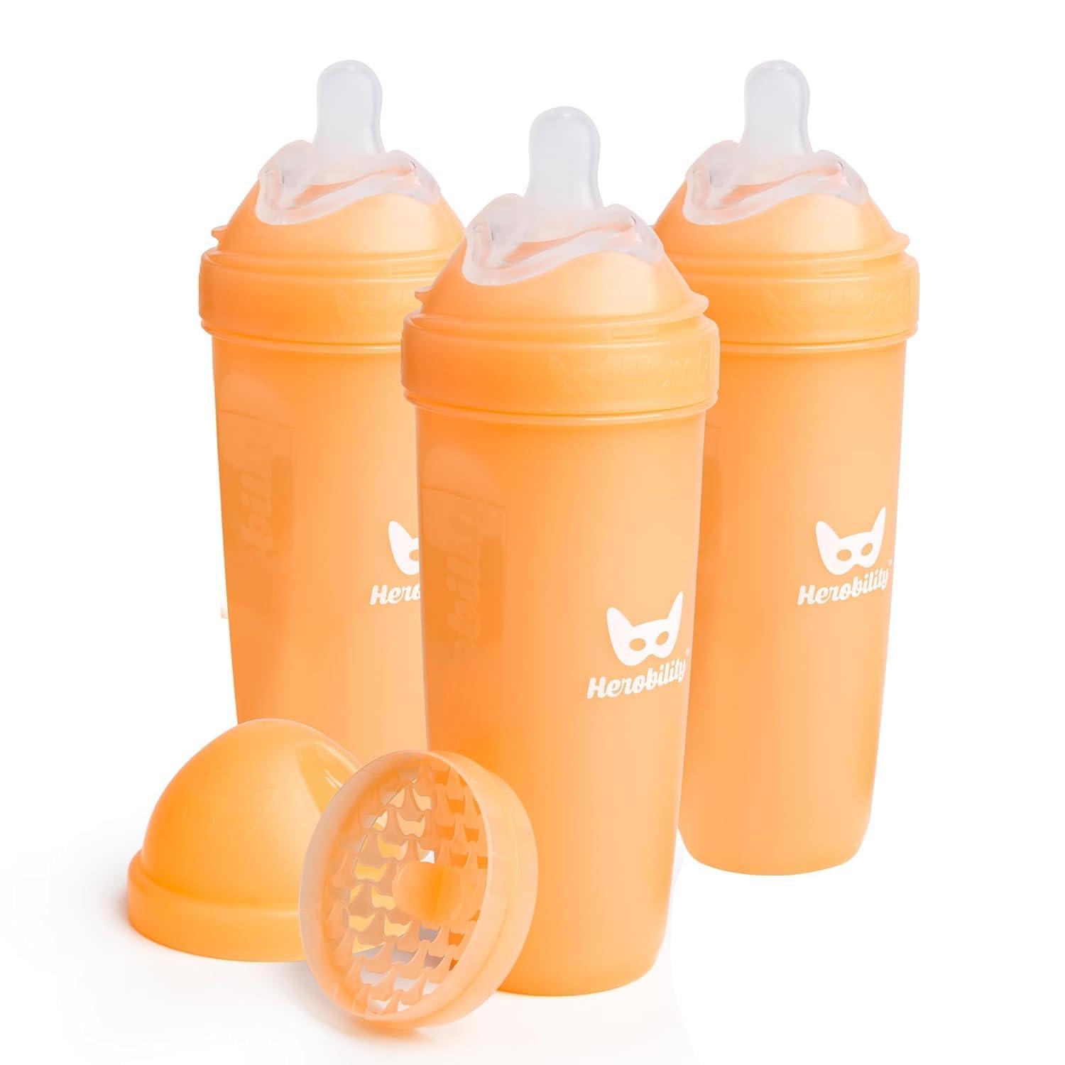 image:imageHerobility AntiColic Baby Bottles 5 fl oz 140 ml Pack of 3 Newborn Baby Bottles Slow Flow Plastic Bottles BreastShaped Teat for Breastfed Babies Small Baby Bottles Swedish Design PurpleA7 Peach